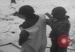 Image of US soldier winter snow capes Vossenack Germany, 1945, second 28 stock footage video 65675080047