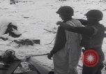 Image of US soldier winter snow capes Vossenack Germany, 1945, second 31 stock footage video 65675080047