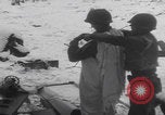 Image of US soldier winter snow capes Vossenack Germany, 1945, second 32 stock footage video 65675080047