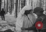 Image of US soldier winter snow capes Vossenack Germany, 1945, second 49 stock footage video 65675080047