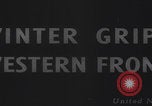 Image of US military vehicles icy roads WW2 Belgium, 1944, second 30 stock footage video 65675080052