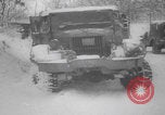 Image of US military vehicles icy roads WW2 Belgium, 1944, second 34 stock footage video 65675080052