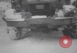 Image of US military vehicles icy roads WW2 Belgium, 1944, second 36 stock footage video 65675080052