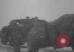 Image of US military vehicles icy roads WW2 Belgium, 1944, second 45 stock footage video 65675080052