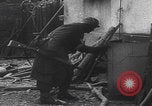 Immagine di Le truppe tedesche entrano nella città ricatturata WW2 Germania, 1944, secondo 21 filmato di repertorio 65675080056