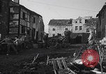 Image of US soldiers Gressenich Germany ruins WW2 Gressenich Germany, 1944, second 48 stock footage video 65675080084