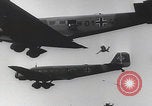 Image of Luftwaffe paratroopers jump from plane Germany, 1942, second 19 stock footage video 65675080105