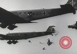 Image of Luftwaffe paratroopers jump from plane Germany, 1942, second 20 stock footage video 65675080105