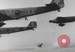 Image of Luftwaffe paratroopers jump from plane Germany, 1942, second 21 stock footage video 65675080105