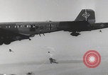 Image of Luftwaffe paratroopers jump from plane Germany, 1942, second 25 stock footage video 65675080105