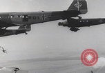 Image of Luftwaffe paratroopers jump from plane Germany, 1942, second 26 stock footage video 65675080105