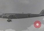 Image of Luftwaffe paratroopers jump from plane Germany, 1942, second 30 stock footage video 65675080105