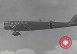 Image of Luftwaffe paratroopers jump from plane Germany, 1942, second 32 stock footage video 65675080105