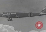 Image of Luftwaffe paratroopers jump from plane Germany, 1942, second 50 stock footage video 65675080105