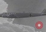 Image of Luftwaffe paratroopers jump from plane Germany, 1942, second 59 stock footage video 65675080105