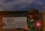Image of Douglas airplane inspection Pleiku South Vietnam, 1968, second 1 stock footage video 65675080115