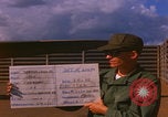 Image of Douglas airplane inspection Pleiku South Vietnam, 1968, second 4 stock footage video 65675080115