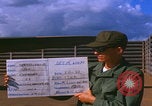 Image of Douglas airplane inspection Pleiku South Vietnam, 1968, second 10 stock footage video 65675080115