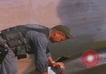 Image of Douglas AC47 Spooky inspected Pleiku South Vietnam, 1968, second 29 stock footage video 65675080117