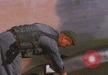 Image of Douglas AC47 Spooky inspected Pleiku South Vietnam, 1968, second 30 stock footage video 65675080117