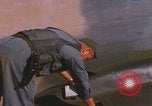 Image of Douglas AC47 Spooky inspected Pleiku South Vietnam, 1968, second 32 stock footage video 65675080117
