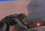 Image of Douglas AC47 Spooky inspected Pleiku South Vietnam, 1968, second 37 stock footage video 65675080117