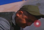 Image of Douglas AC47 Spooky inspected Pleiku South Vietnam, 1968, second 52 stock footage video 65675080117