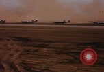 Image of Consolidated B-24 bombers take off Libya, 1943, second 4 stock footage video 65675080136