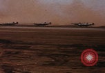 Image of Consolidated B-24 bombers take off Libya, 1943, second 5 stock footage video 65675080136