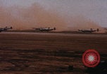Image of Consolidated B-24 bombers take off Libya, 1943, second 7 stock footage video 65675080136