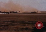 Image of Consolidated B-24 bombers take off Libya, 1943, second 8 stock footage video 65675080136