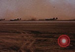 Image of Consolidated B-24 bombers take off Libya, 1943, second 16 stock footage video 65675080136