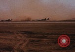 Image of Consolidated B-24 bombers take off Libya, 1943, second 17 stock footage video 65675080136