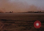 Image of Consolidated B-24 bombers take off Libya, 1943, second 20 stock footage video 65675080136