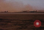 Image of Consolidated B-24 bombers take off Libya, 1943, second 21 stock footage video 65675080136