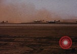 Image of Consolidated B-24 bombers take off Libya, 1943, second 22 stock footage video 65675080136