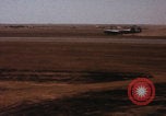 Image of Consolidated B-24 bombers take off Libya, 1943, second 34 stock footage video 65675080136