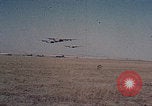 Image of B-24 Liberator bombers landing Berca Airfield Benghazi Libya, 1943, second 4 stock footage video 65675080139