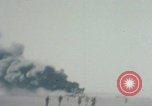 Image of Consolidated B-24 Liberator bomber burning Berca Airfield Benghazi Libya, 1943, second 1 stock footage video 65675080140