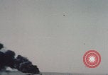 Image of Consolidated B-24 Liberator bomber burning Berca Airfield Benghazi Libya, 1943, second 5 stock footage video 65675080140