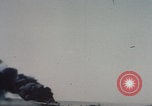 Image of Consolidated B-24 Liberator bomber burning Berca Airfield Benghazi Libya, 1943, second 6 stock footage video 65675080140