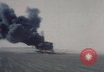 Image of Consolidated B-24 Liberator bomber burning Berca Airfield Benghazi Libya, 1943, second 9 stock footage video 65675080140
