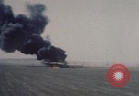 Image of Consolidated B-24 Liberator bomber burning Berca Airfield Benghazi Libya, 1943, second 10 stock footage video 65675080140