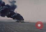 Image of Consolidated B-24 Liberator bomber burning Berca Airfield Benghazi Libya, 1943, second 11 stock footage video 65675080140