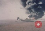 Image of Consolidated B-24 Liberator bomber burning Berca Airfield Benghazi Libya, 1943, second 14 stock footage video 65675080140