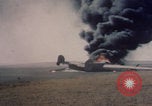 Image of Consolidated B-24 Liberator bomber burning Berca Airfield Benghazi Libya, 1943, second 17 stock footage video 65675080140