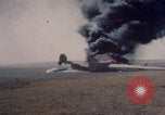 Image of Consolidated B-24 Liberator bomber burning Berca Airfield Benghazi Libya, 1943, second 18 stock footage video 65675080140