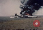 Image of Consolidated B-24 Liberator bomber burning Berca Airfield Benghazi Libya, 1943, second 19 stock footage video 65675080140