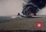 Image of Consolidated B-24 Liberator bomber burning Berca Airfield Benghazi Libya, 1943, second 20 stock footage video 65675080140
