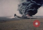 Image of Consolidated B-24 Liberator bomber burning Berca Airfield Benghazi Libya, 1943, second 24 stock footage video 65675080140
